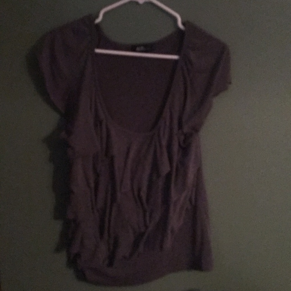 Gray ruffled layered top.